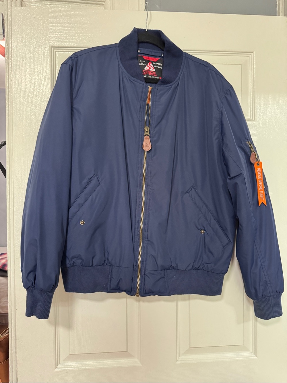 Aspire Navy Bomber Jacket with Orange Pull Tab